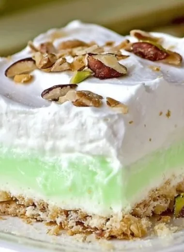 Deliciously creamy easy Pistachio Lush dessert served in a glass dish