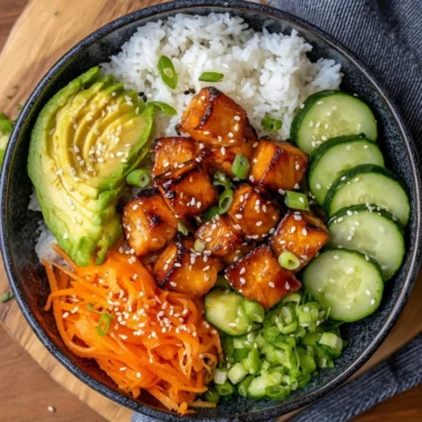 Delicious Salmon Bowl with fresh vegetables and rice