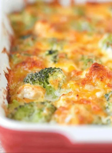 Delicious chicken broccoli bake dish with melted cheese and fresh ingredients