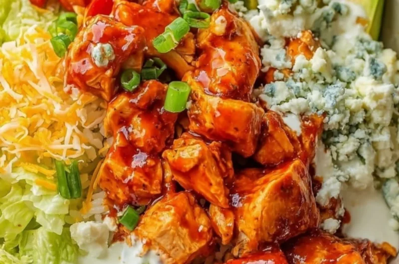 Delicious Buffalo Chicken Bowls filled with spicy chicken, vegetables, and creamy sauce.