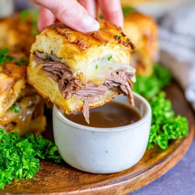 Delicious French Dip Sliders with tender beef and au jus for dipping.