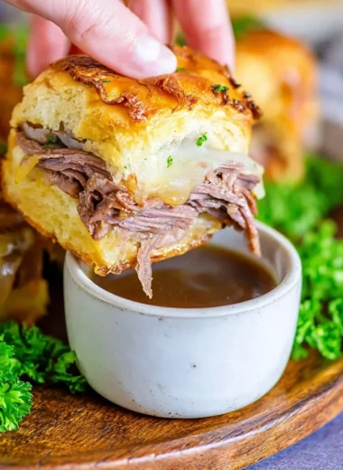 Delicious French Dip Sliders with tender beef and au jus for dipping.
