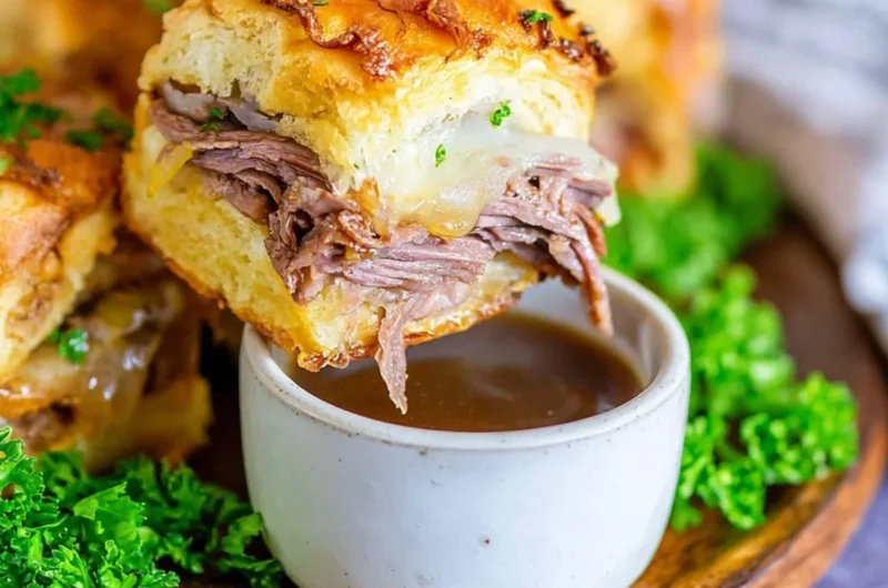 Delicious French Dip Sliders with tender beef and au jus for dipping.