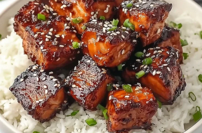 Honey Garlic Salmon Bites Bowl with vegetables and garnishes