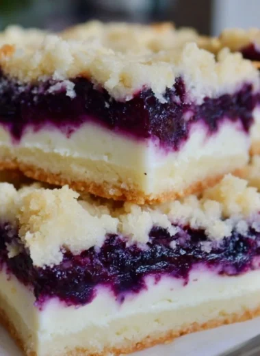 Lemon blueberry shortbread bars with fresh blueberries and a buttery crust