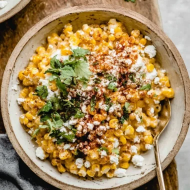 Delicious Mexican street corn casserole topped with cheese and cilantro