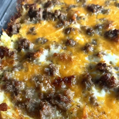Sausage Hashbrown Breakfast Casserole served in a baking dish