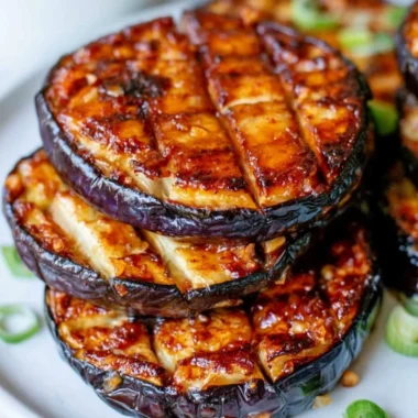 crispy air fryer eggplant slices served on a plate