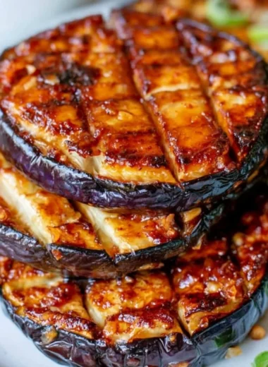 crispy air fryer eggplant slices served on a plate