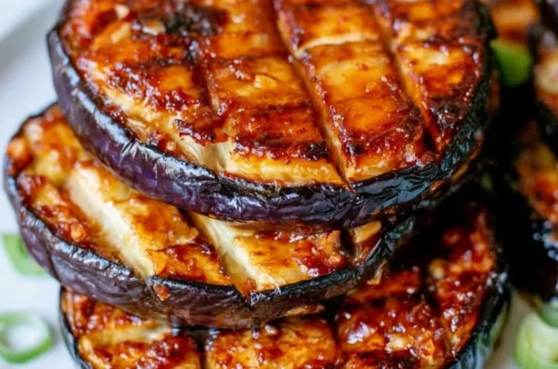 crispy air fryer eggplant slices served on a plate