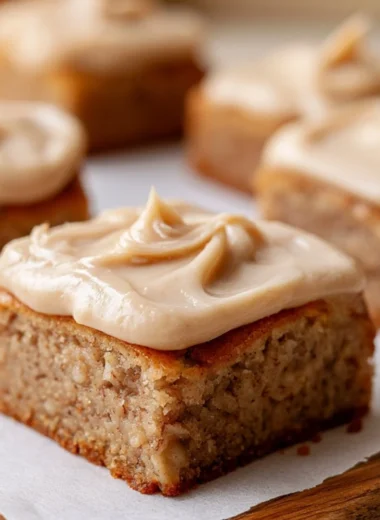 Delicious banana bread brownies served on a rustic wooden table