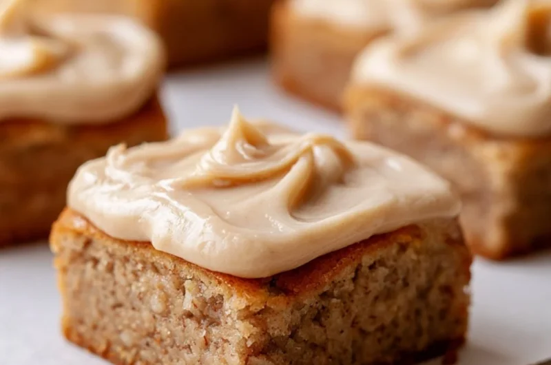 Delicious banana bread brownies served on a rustic wooden table