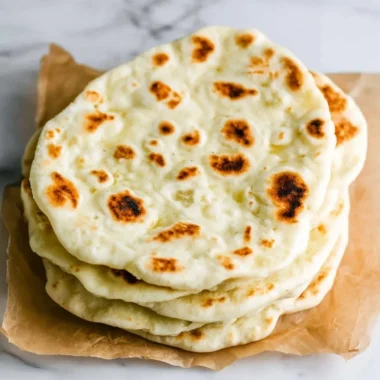 Freshly made Greek pita bread served with traditional fillings