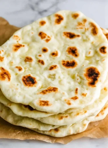 Freshly made Greek pita bread served with traditional fillings
