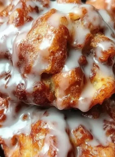 Delicious cinnamon apple fritters sprinkled with powdered sugar