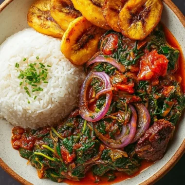 Bowl of Ghanaian Spinach Stew with spices and ingredients prepared
