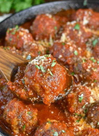 Homemade Italian meatballs cooked in marinara sauce.