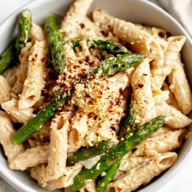 Delicious Vegan Lemon White Bean Pasta served with fresh herbs and lemon zest