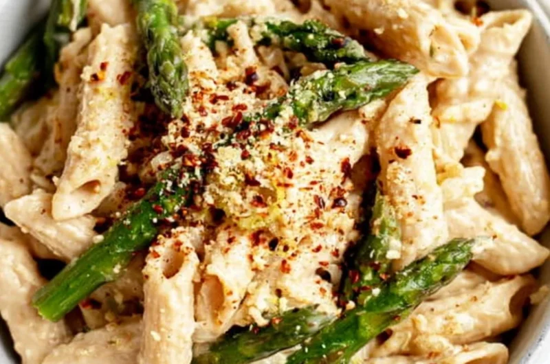 Delicious Vegan Lemon White Bean Pasta served with fresh herbs and lemon zest
