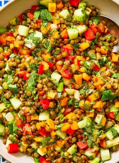 Colorful Mediterranean Lentil Salad with fresh vegetables and herbs