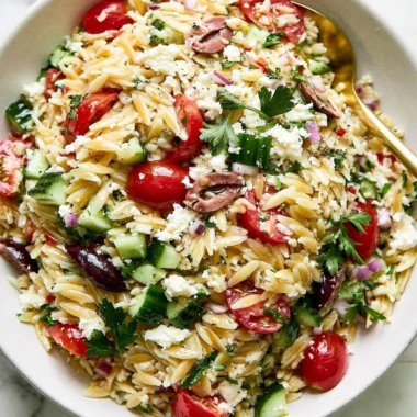 Mediterranean Orzo Salad with fresh vegetables and dressing