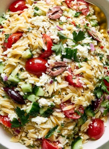 Mediterranean Orzo Salad with fresh vegetables and dressing