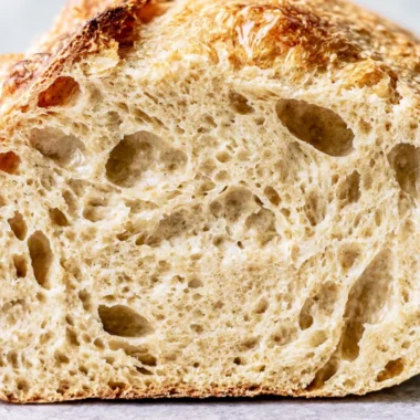 Freshly baked sourdough bread with a crispy crust and soft interior.