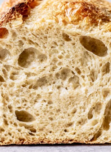 Freshly baked sourdough bread with a crispy crust and soft interior.