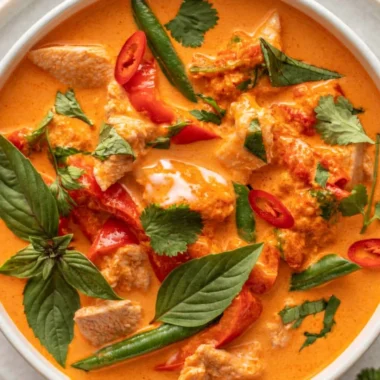 Delicious Thai red curry with chicken served in a bowl